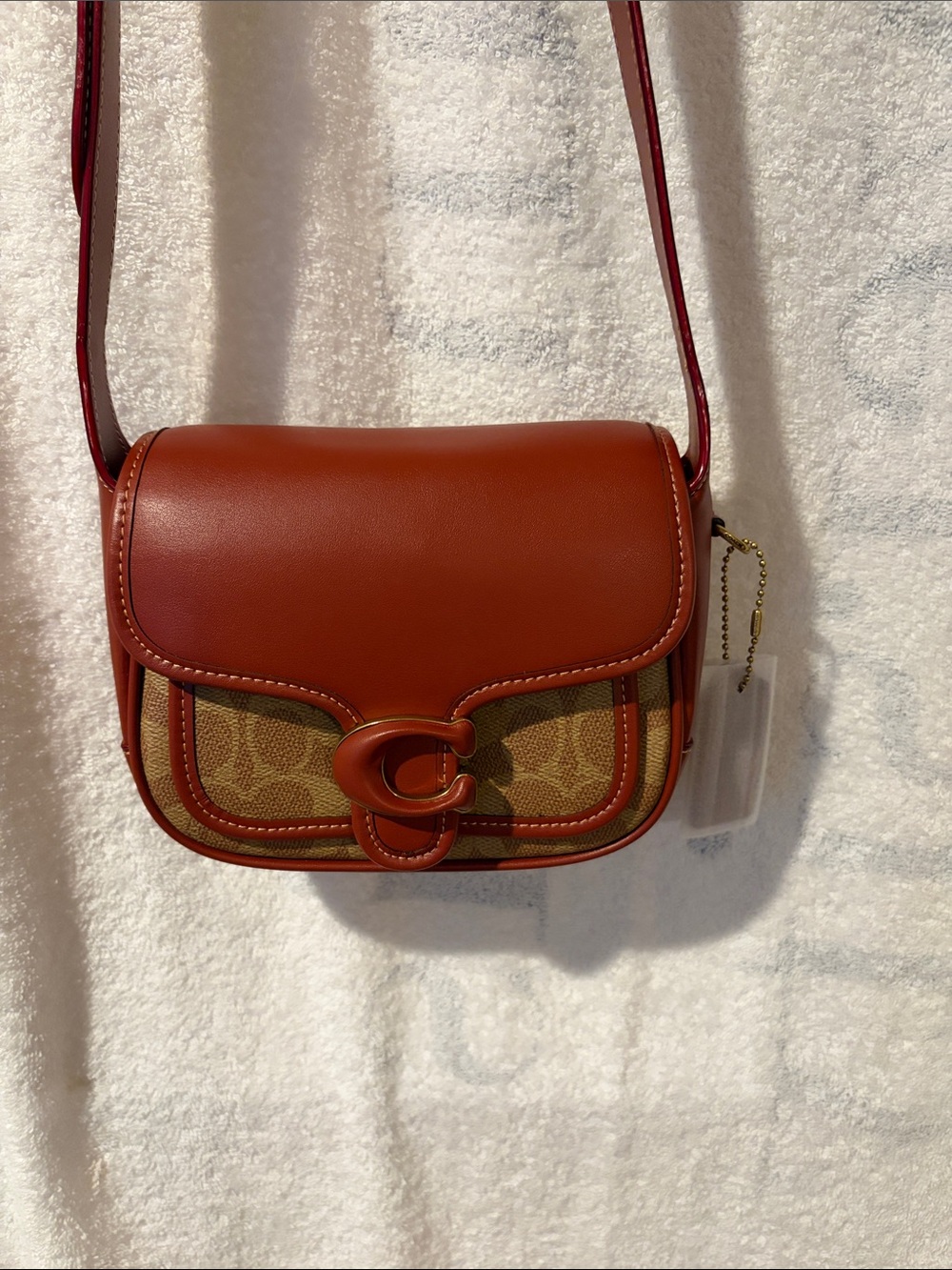 Coach Small Saddle Crossbody in Rust and Signature Canvas